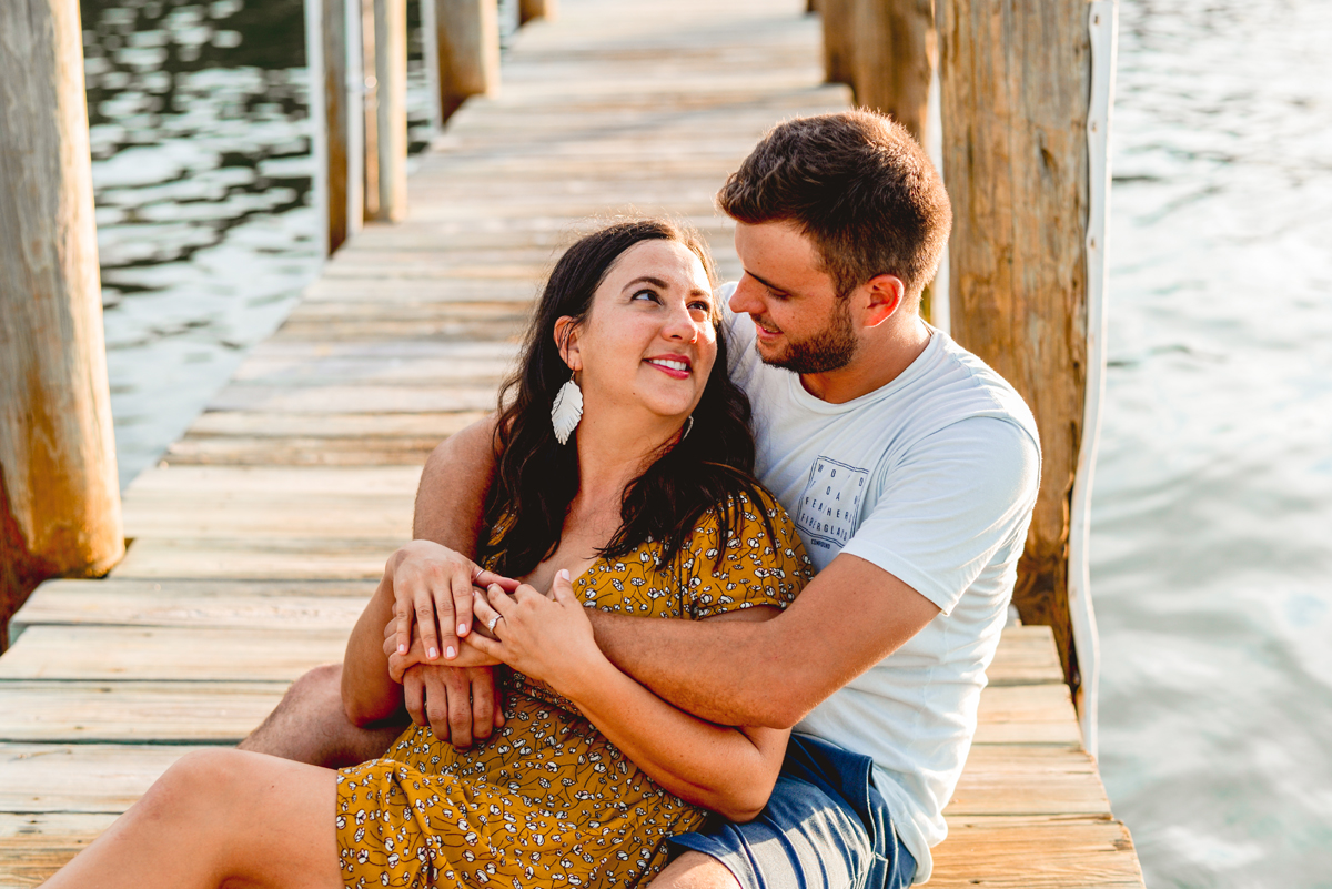 sitting, dock, water, couple, hugging