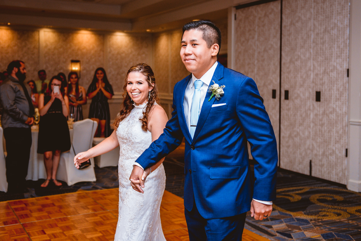 bride, groom, portrait, wedding reception, entrance