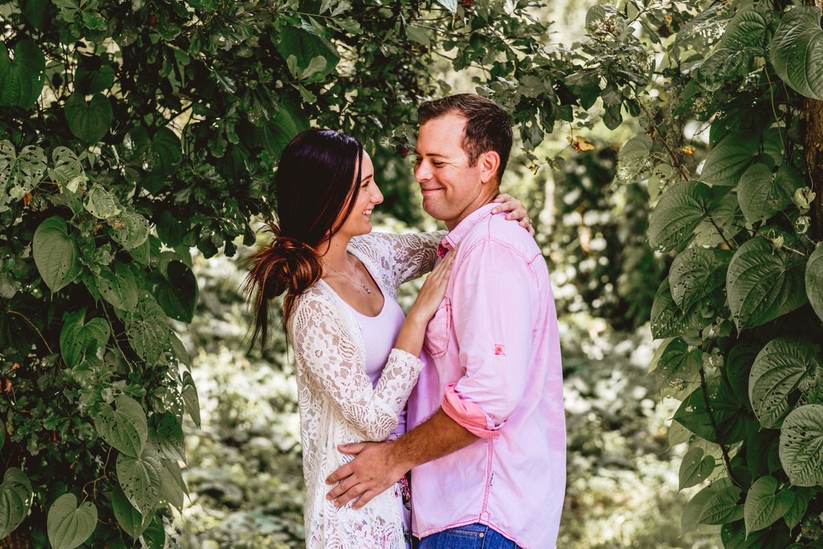 vines, greenery, sunshine, couple, laughing